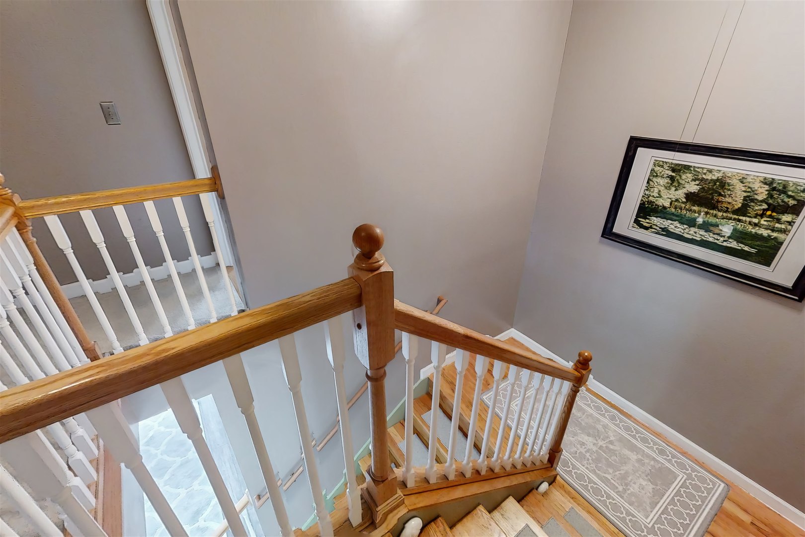 4 Cloverhill Circle Bloomington, IL 61705 - Photo 37 of 63 a view of a hallway with staircase