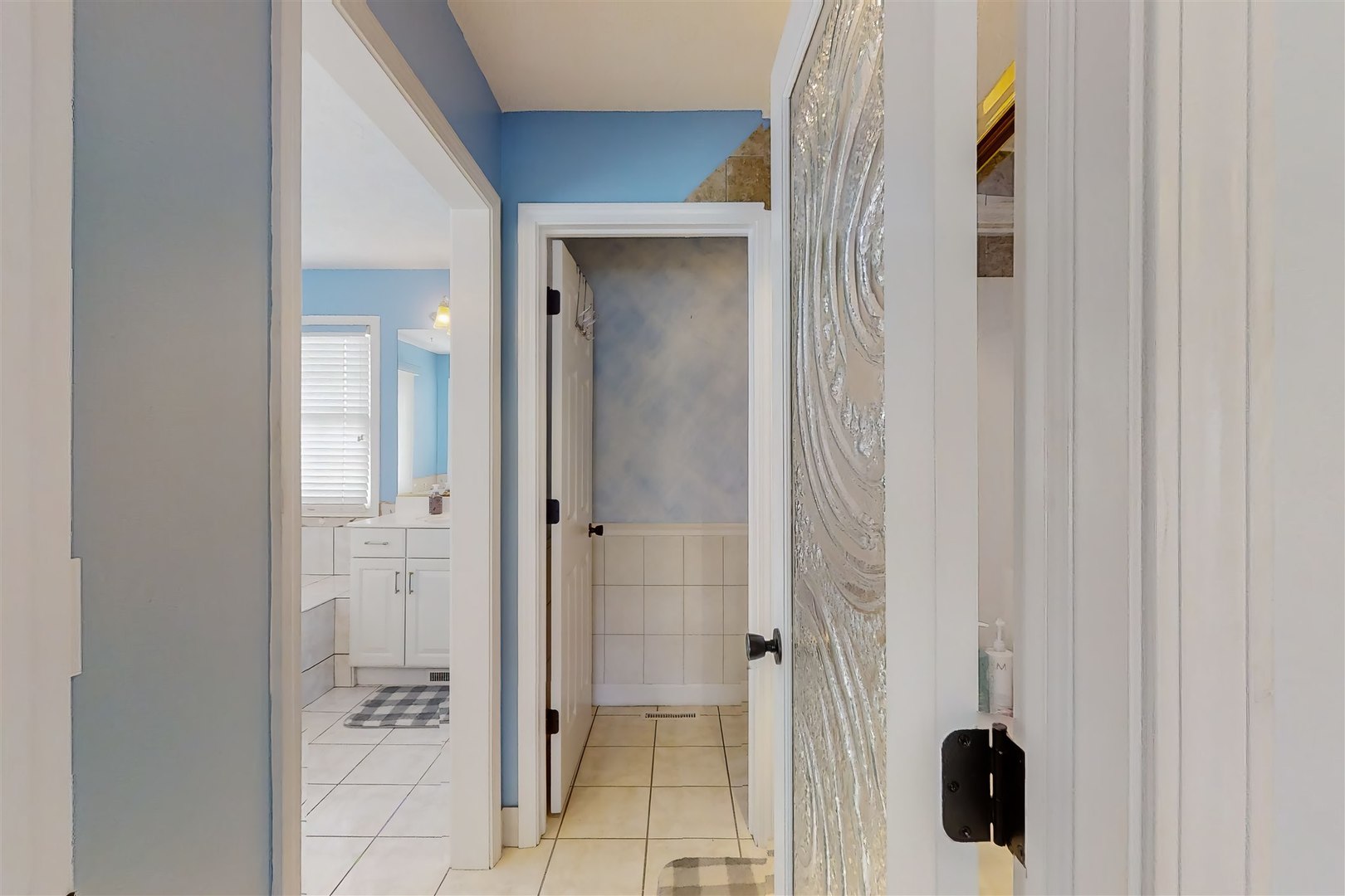 4 Cloverhill Circle Bloomington, IL 61705 - Photo 40 of 63 a bathroom with a shower and a glass door