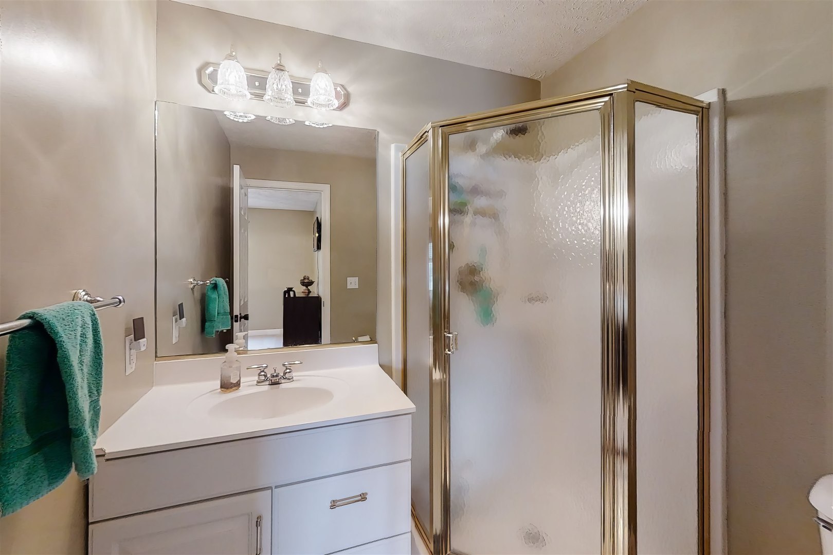 4 Cloverhill Circle Bloomington, IL 61705 - Photo 50 of 63 a bathroom with a sink and mirror