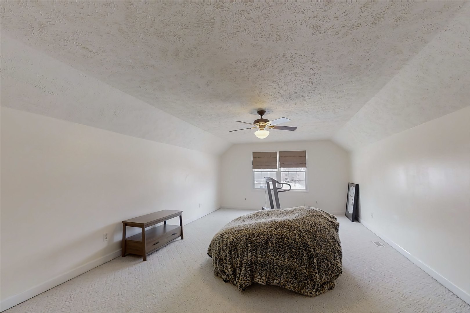 4 Cloverhill Circle Bloomington, IL 61705 - Photo 51 of 63 a bedroom with a bed and a chandelier