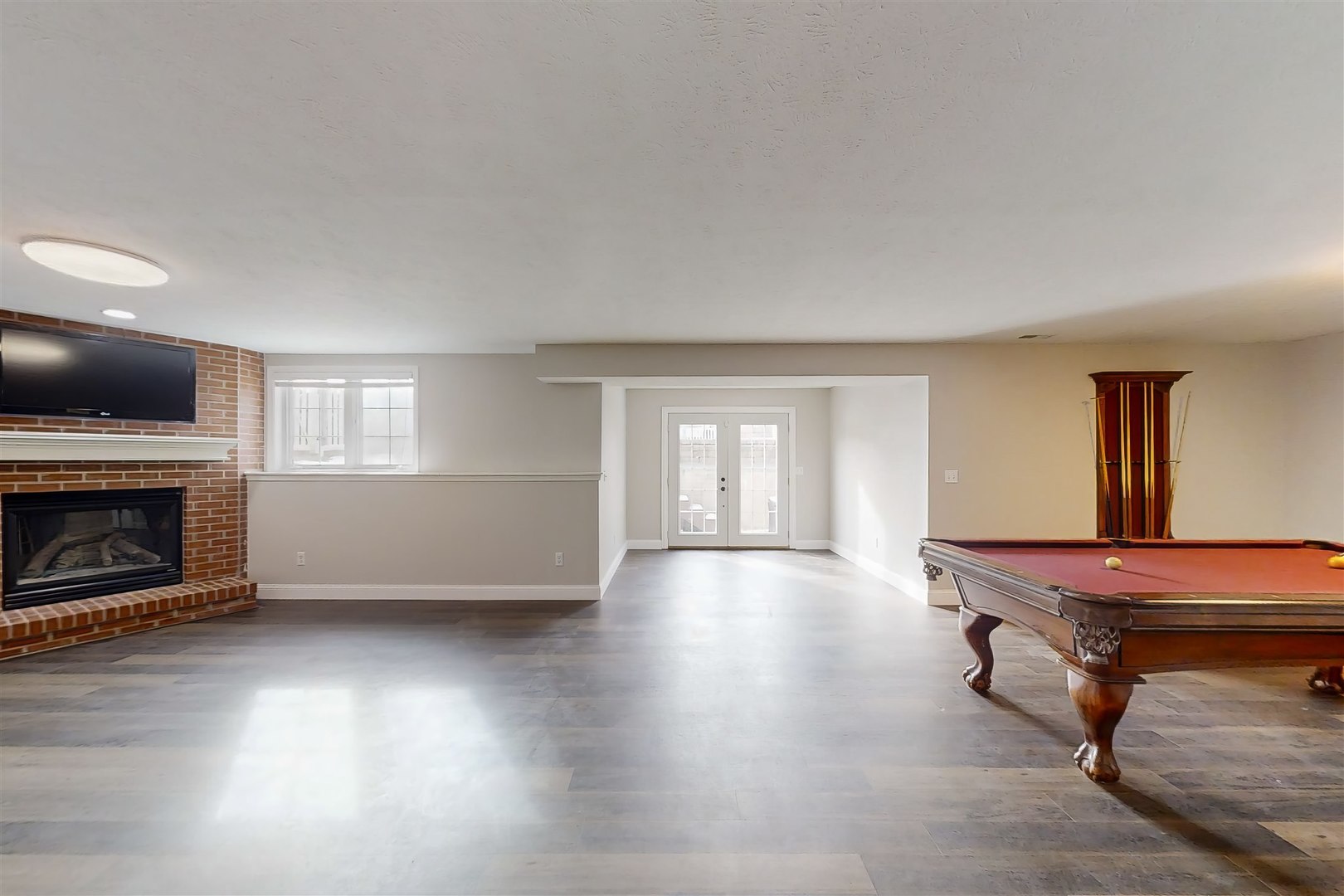 4 Cloverhill Circle Bloomington, IL 61705 - Photo 59 of 63 a living room with furniture and a fireplace