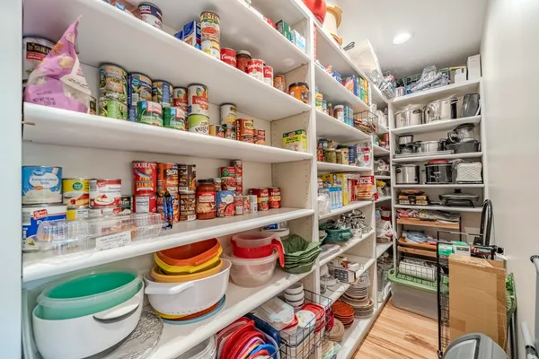 a utility room with lots of clutter and toys