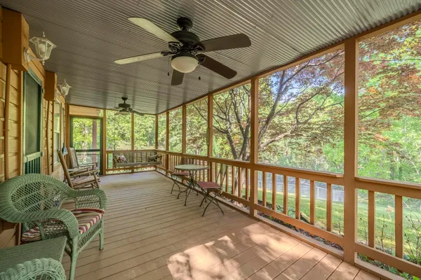 a view of a porch with furniture