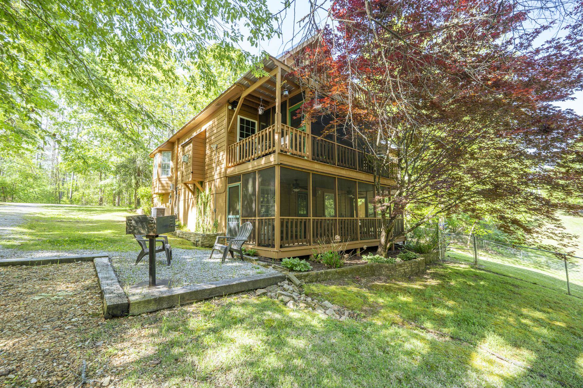 85 Cr 256 Road Iuka, MS 38852 - Photo 32 of 38 Wood-sided residence featuring a multi-level deck and screened porch