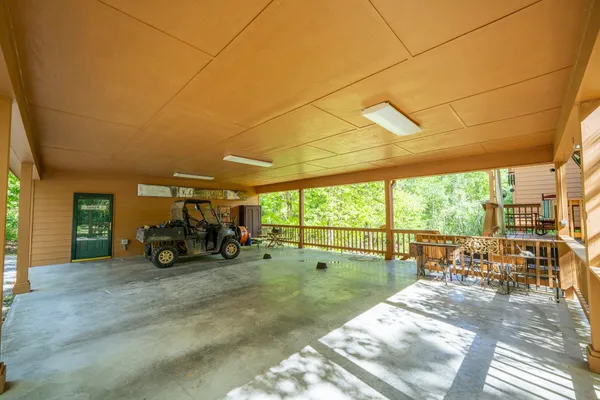 a view of garage with a table and chairs