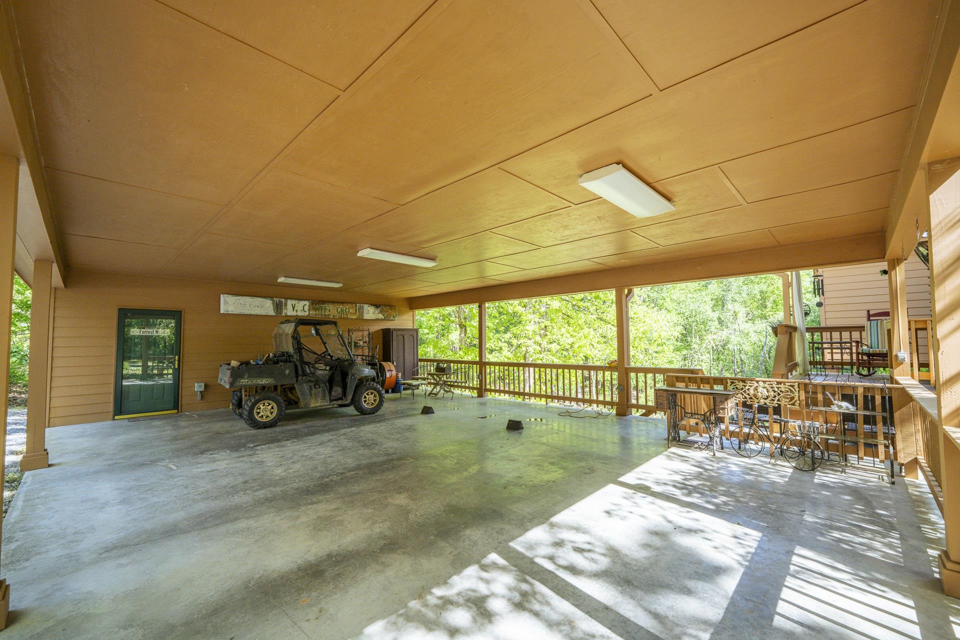 85 Cr 256 Road Iuka, MS 38852 - Photo 37 of 38 Expansive covered concrete patio featuring a wood-paneled ceiling, wood siding, and recessed lighting
