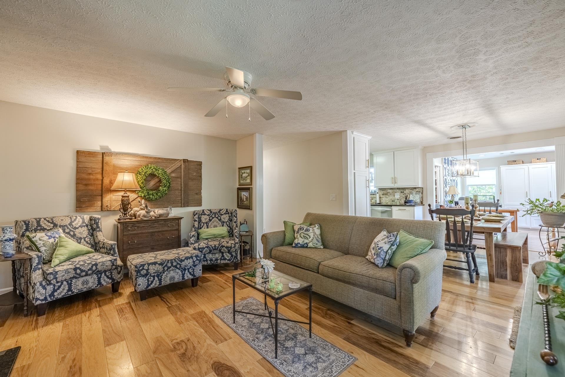 85 Cr 256 Road Iuka, MS 38852 - Photo 7 of 38 Hardwood flooring spanning the living and dining areas