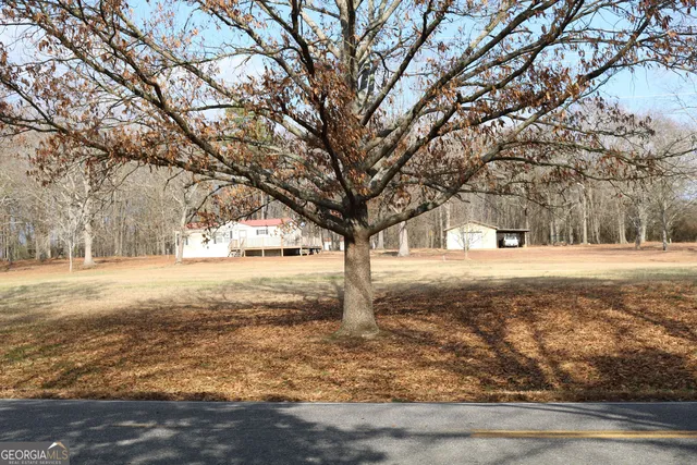 a view of yard covered with snow