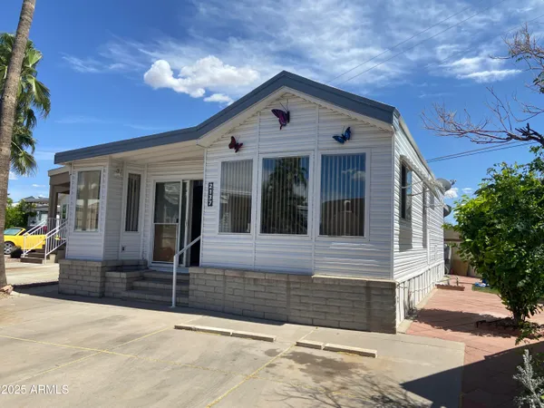 a front view of a house with garage