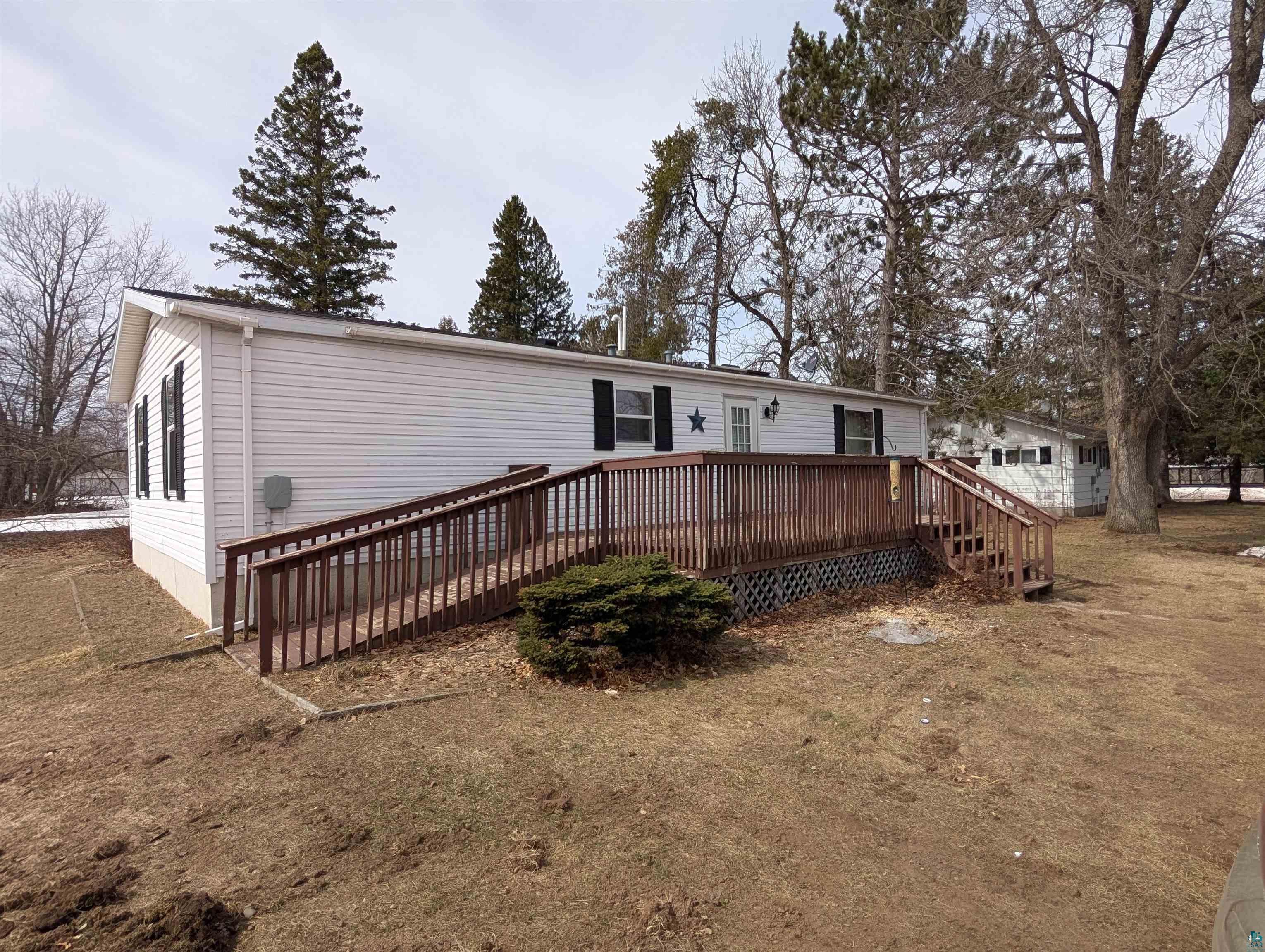 54700 Cudworth Avenue Grand View, WI 54839 - Photo 7 of 21 Back of property featuring a wooden deck