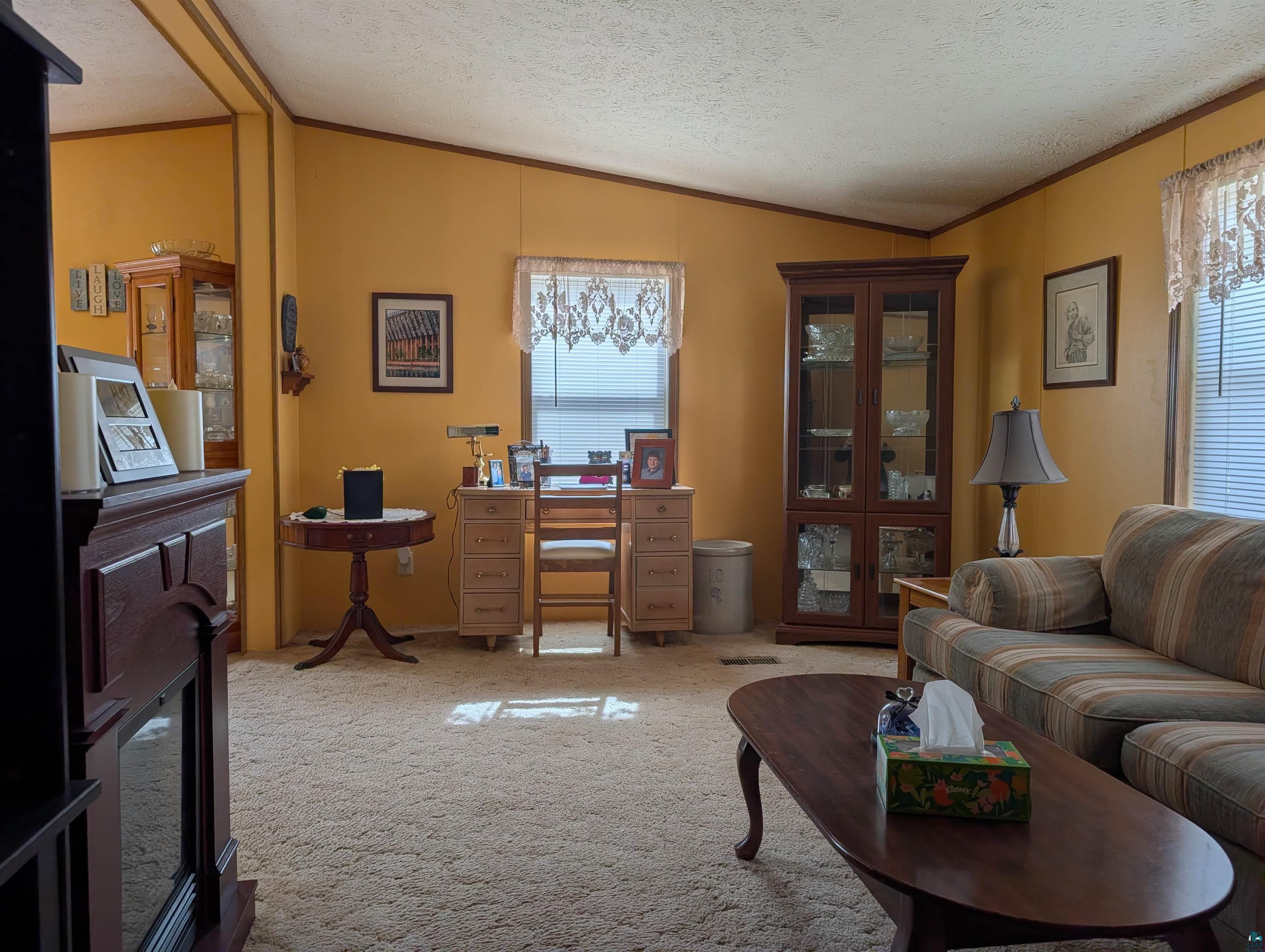 54700 Cudworth Avenue Grand View, WI 54839 - Photo 8 of 21 Office area with ornamental molding and light carpet