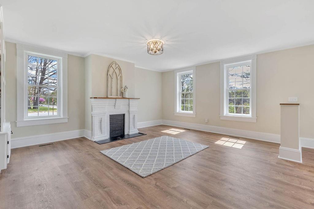 800 River Road Beaver, PA 15009 - Photo 13 of 47 a view of an empty room with window and fireplace