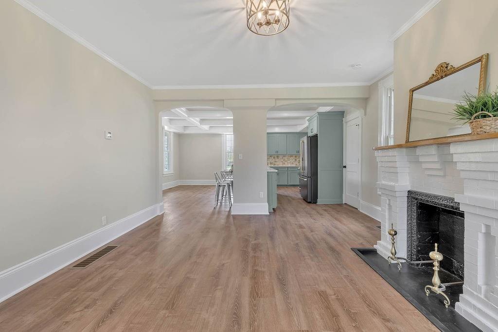 800 River Road Beaver, PA 15009 - Photo 16 of 47 a view of empty room with wooden floor and fireplace