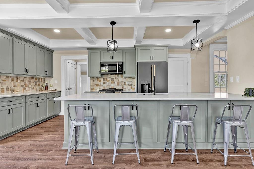 800 River Road Beaver, PA 15009 - Photo 20 of 47 a kitchen with cabinets and chairs