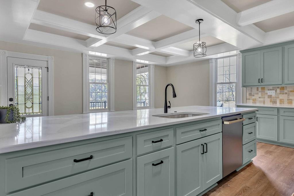 800 River Road Beaver, PA 15009 - Photo 21 of 47 a kitchen with cabinets a window and appliances