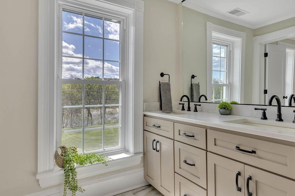 800 River Road Beaver, PA 15009 - Photo 26 of 47 a bathroom with a sink a mirror and a window