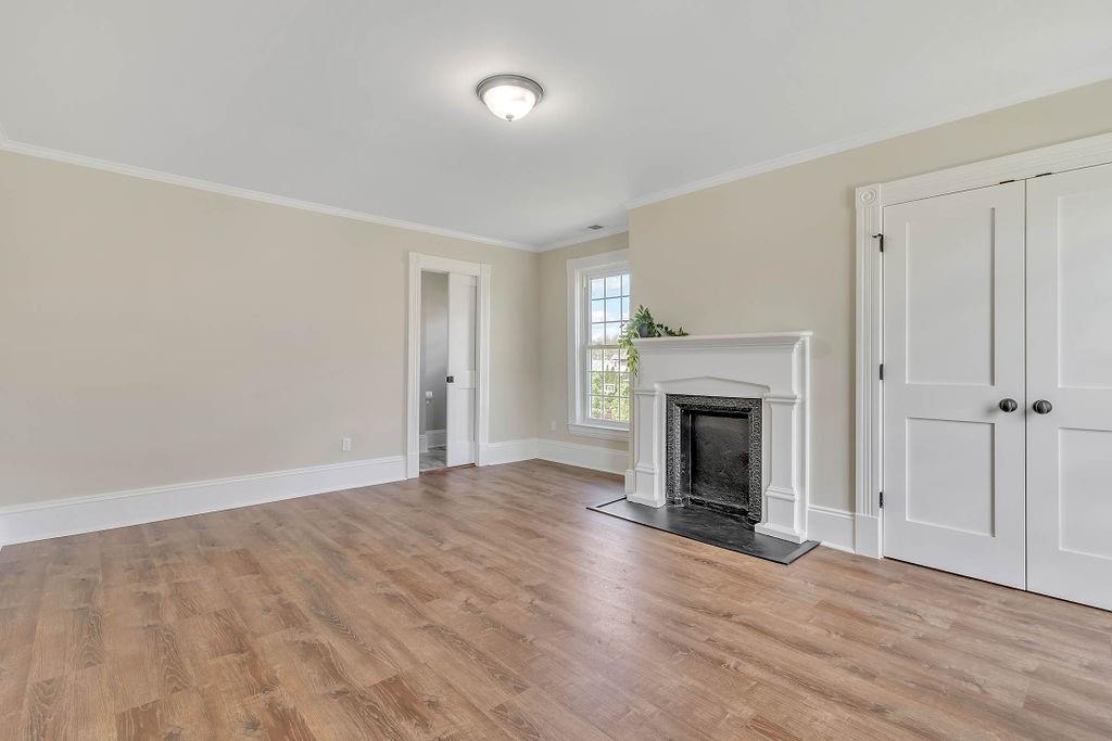 800 River Road Beaver, PA 15009 - Photo 32 of 47 wooden floor fireplace and natural light in room