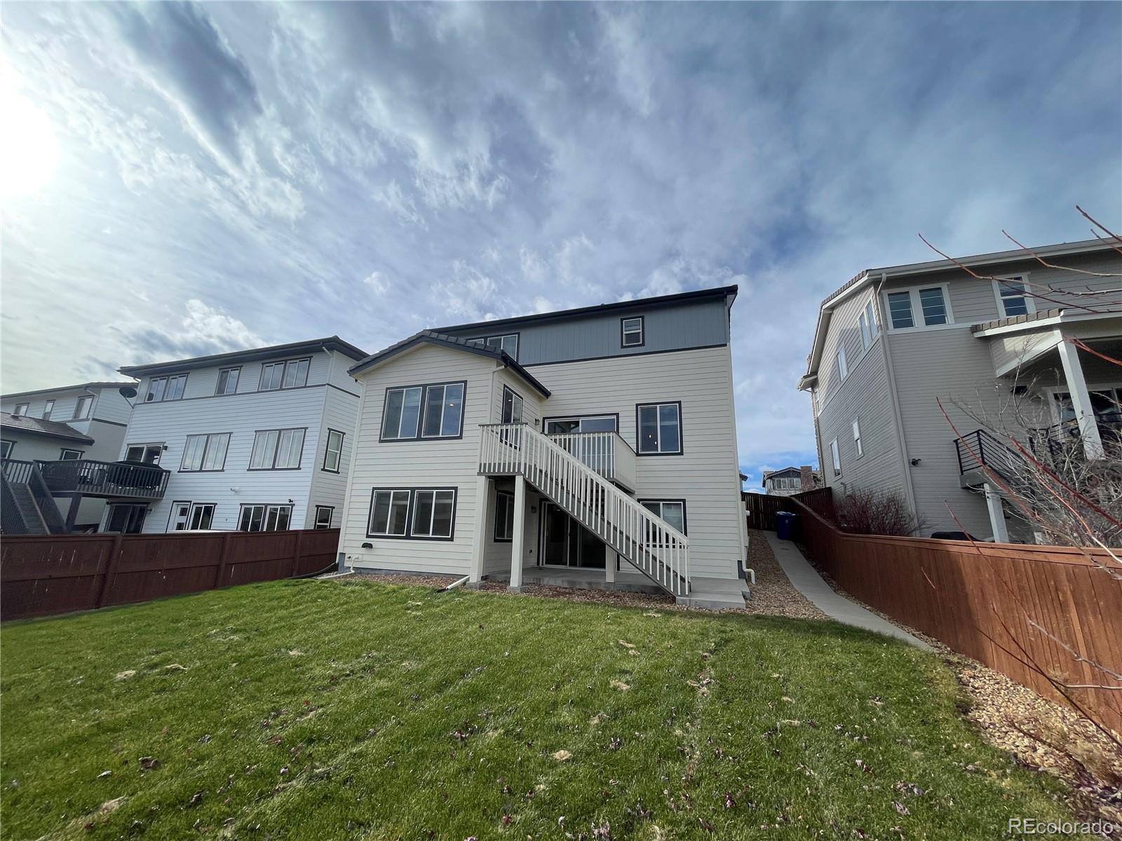 10951 Touchstone Loop Parker, CO 80134 - Photo 31 of 35 a house view with a outdoor space