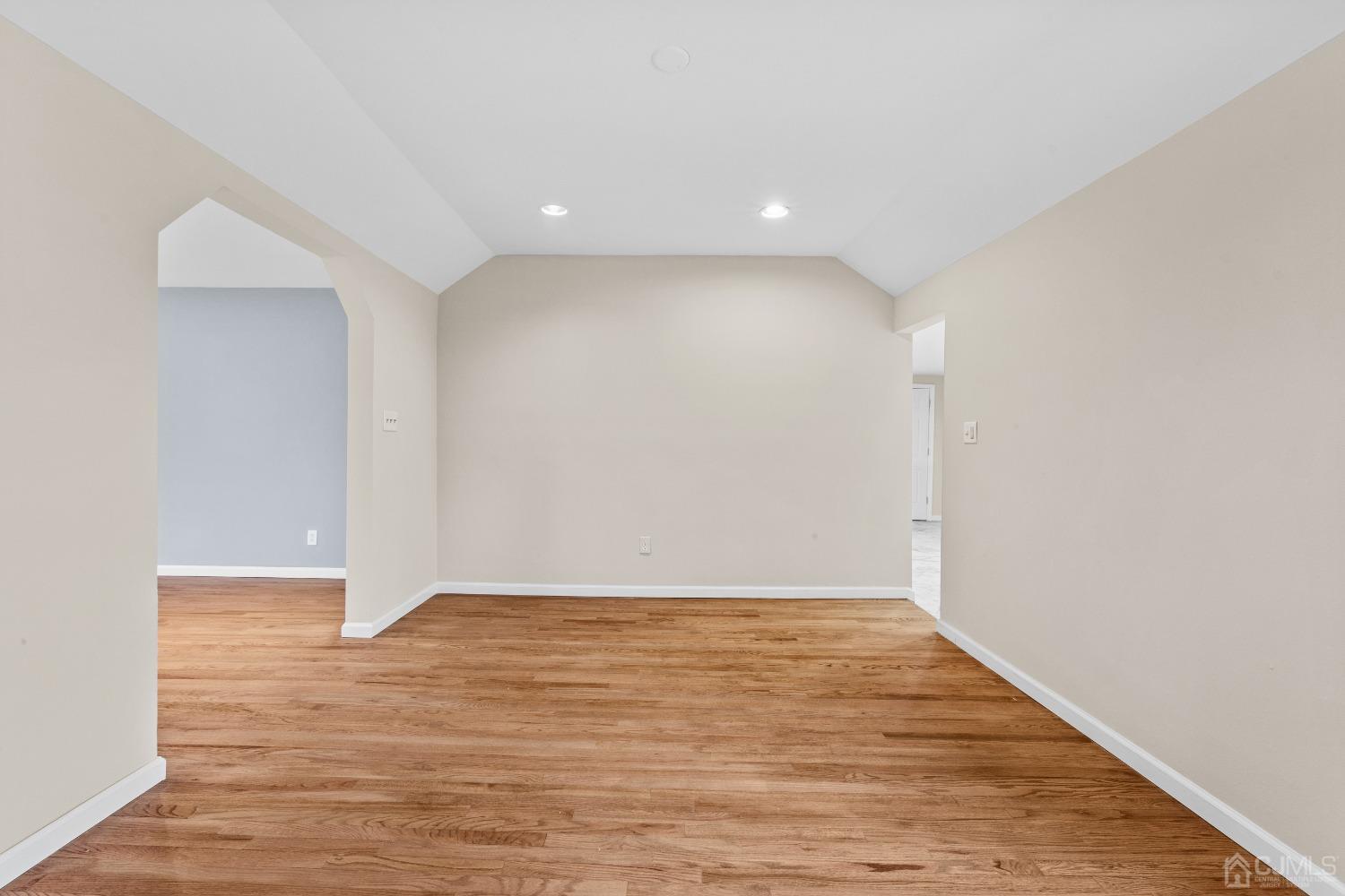 145 Texas Road Old Bridge, NJ 08857 - Photo 20 of 35 a view of an empty room with wooden floor