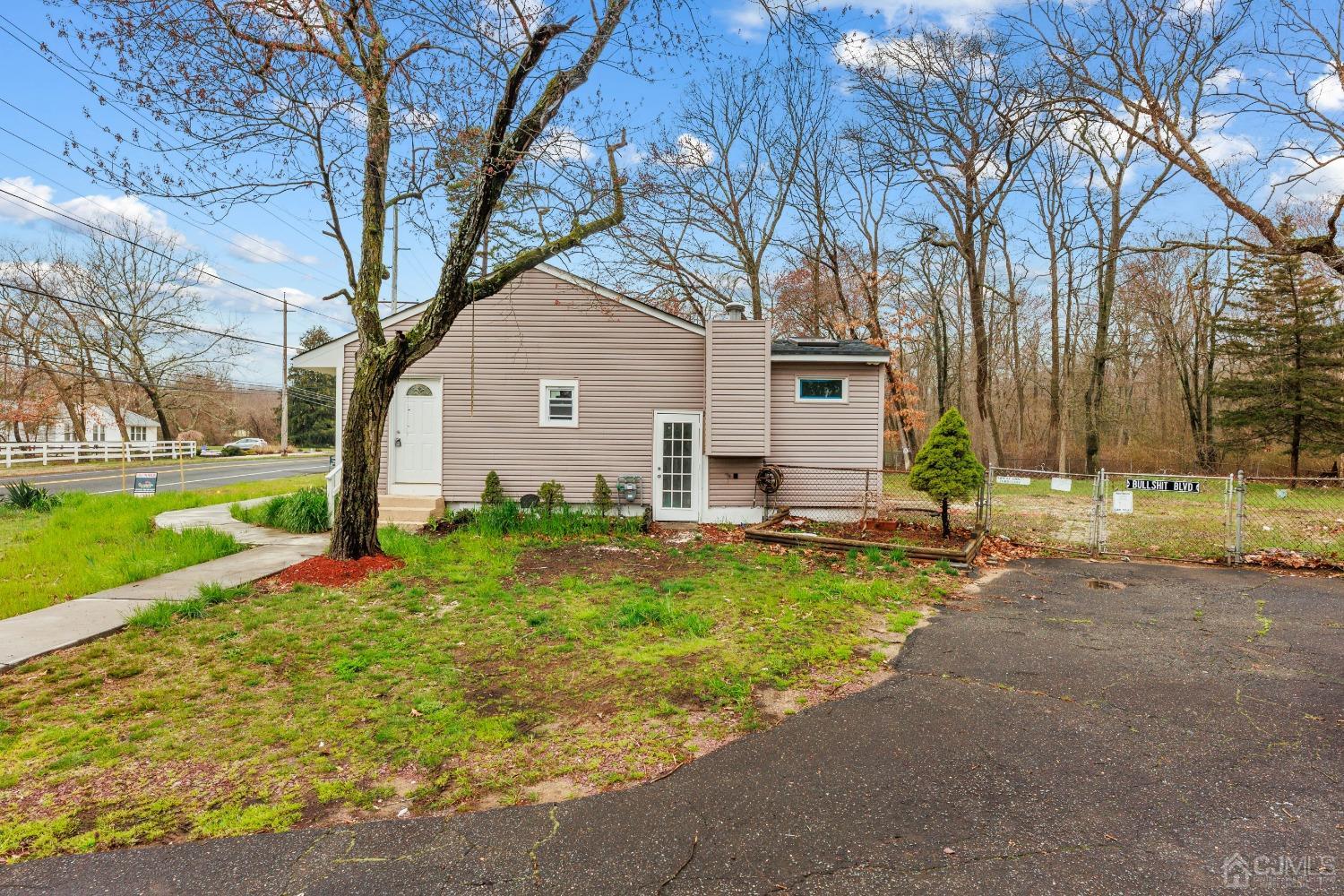145 Texas Road Old Bridge, NJ 08857 - Photo 3 of 35 a view of backyard of house with green space