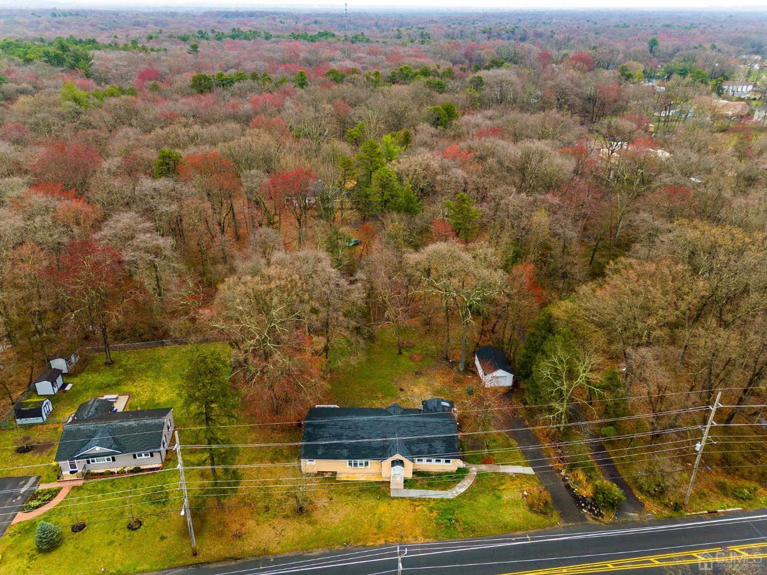 145 Texas Road Old Bridge, NJ 08857 - Photo 34 of 35 an aerial view of residential houses with outdoor space