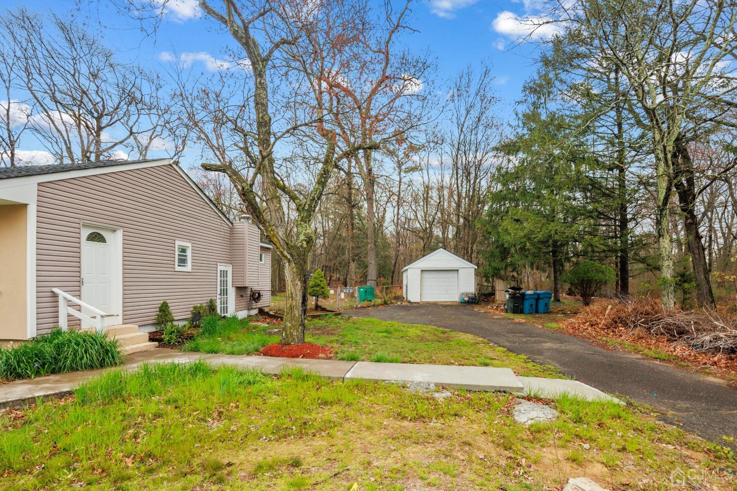 145 Texas Road Old Bridge, NJ 08857 - Photo 5 of 35 a view of a house with yard and tree s