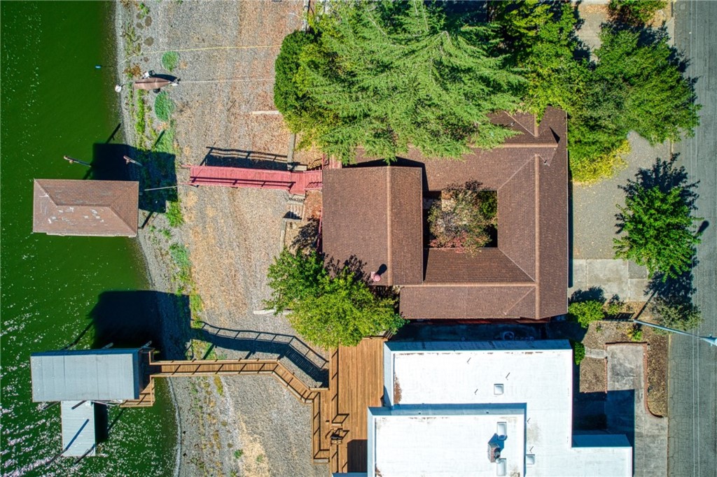 7783 Cora Drive Lucerne, CA 95458 - Photo 28 of 41 an aerial view of a house with a yard and garden