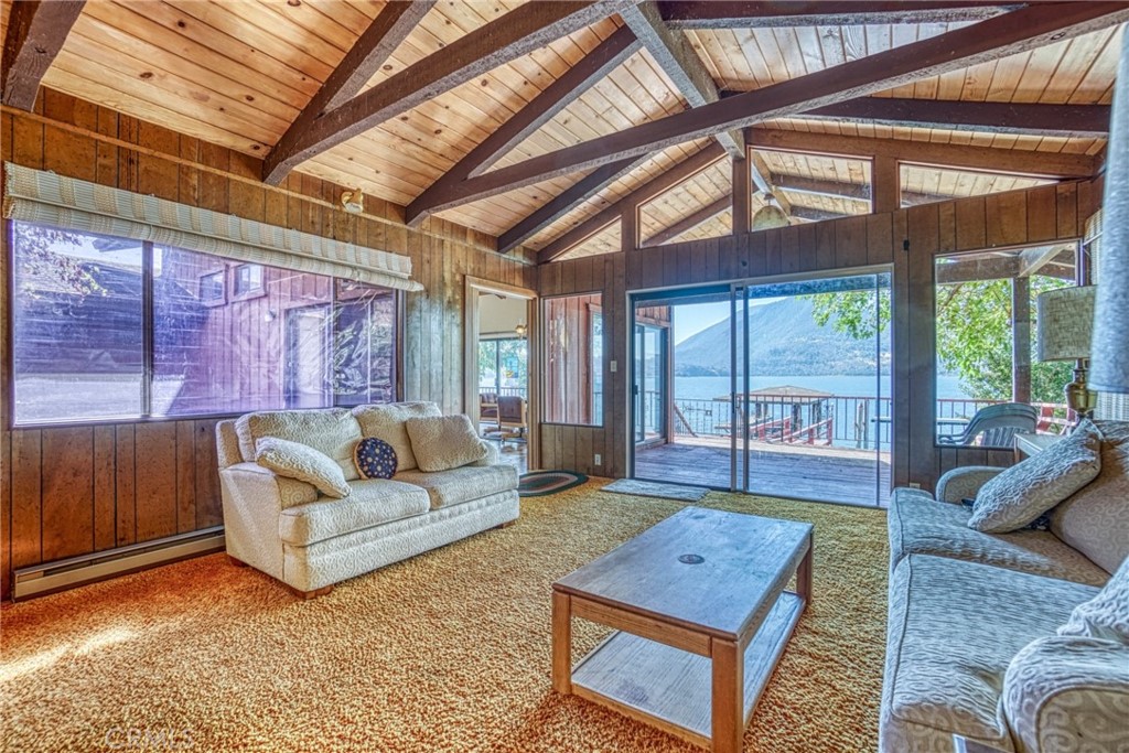 7783 Cora Drive Lucerne, CA 95458 - Photo 10 of 41 a living room with furniture and a large window
