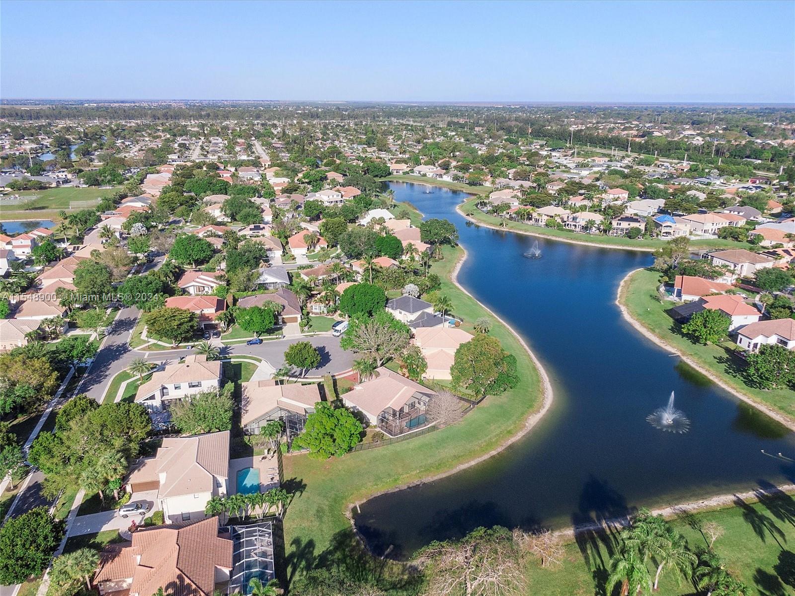 22286 Tupelo Place Boca Raton, FL 33428 - Photo 54 of 60 an aerial view of residential houses with outdoor space and ocean view