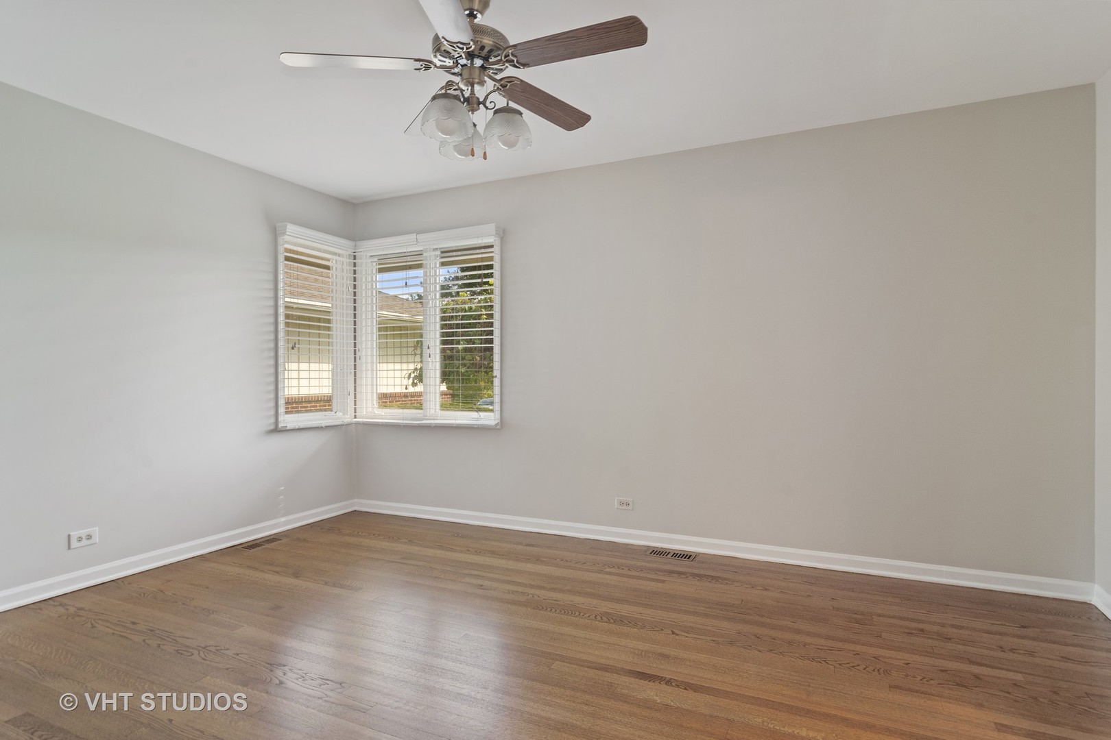 128 Colony Drive Inverness, IL 60010 - Photo 11 of 22 wooden floor in an empty room with a window