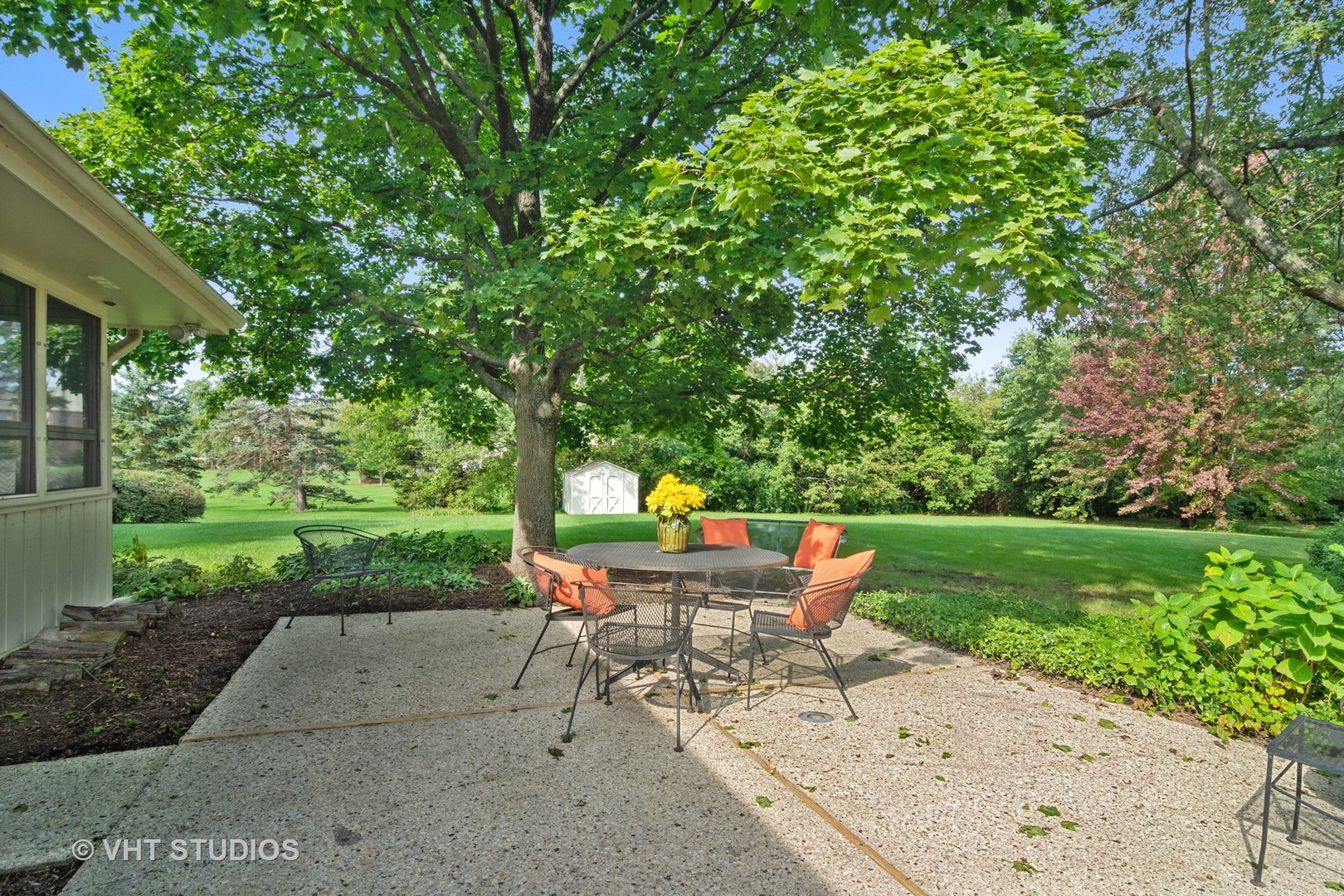 128 Colony Drive Inverness, IL 60010 - Photo 15 of 22 a backyard of a house with outdoor seating