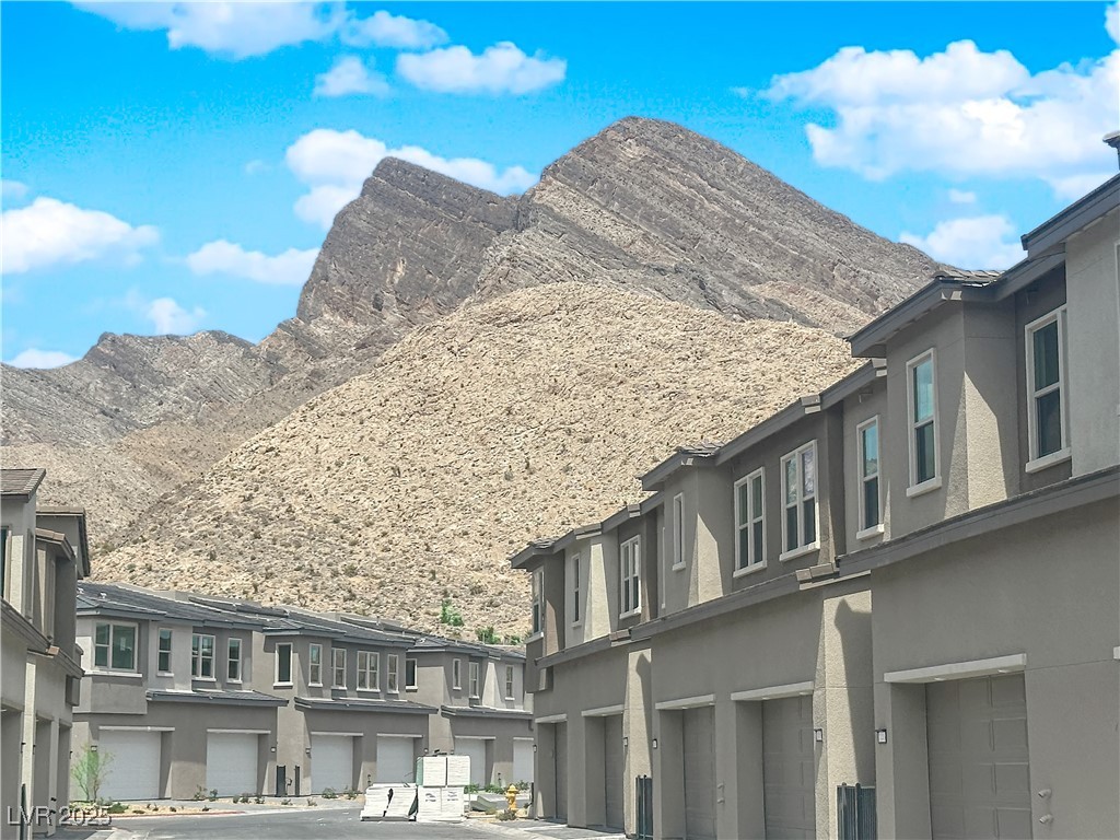 2467 Altitude Street Las Vegas, NV 89138 - Photo 4 of 7 View of mountain backdrop with nearby suburban area
