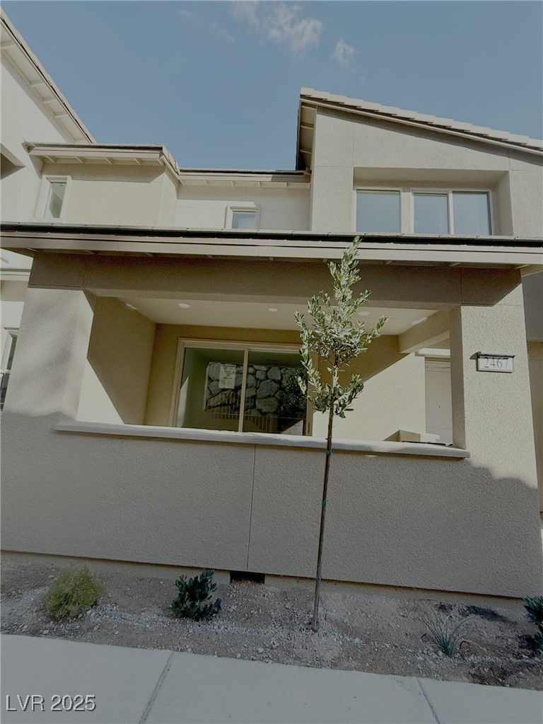 2467 Altitude Street Las Vegas, NV 89138 - Photo 7 of 7 View of side of home with stucco siding