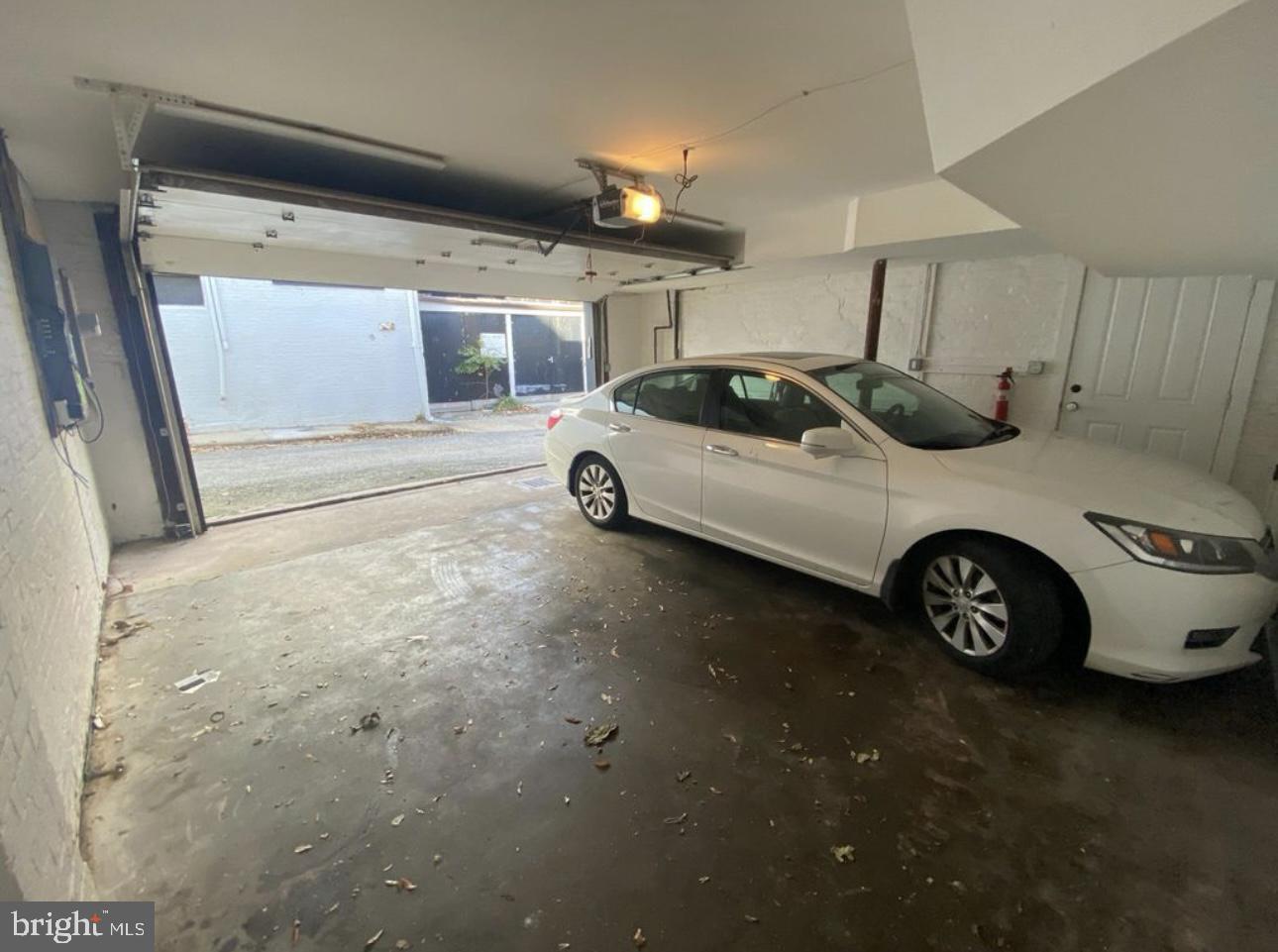 19 Branch Lane East Baltimore, MD 21202 - Photo 13 of 13 a car parked in garage