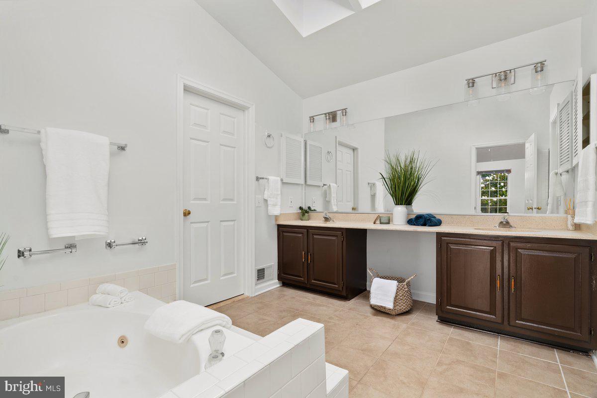 8550 Yoder Street Manassas, VA 20110 - Photo 22 of 39 Primary bathroom with double vanity sinks