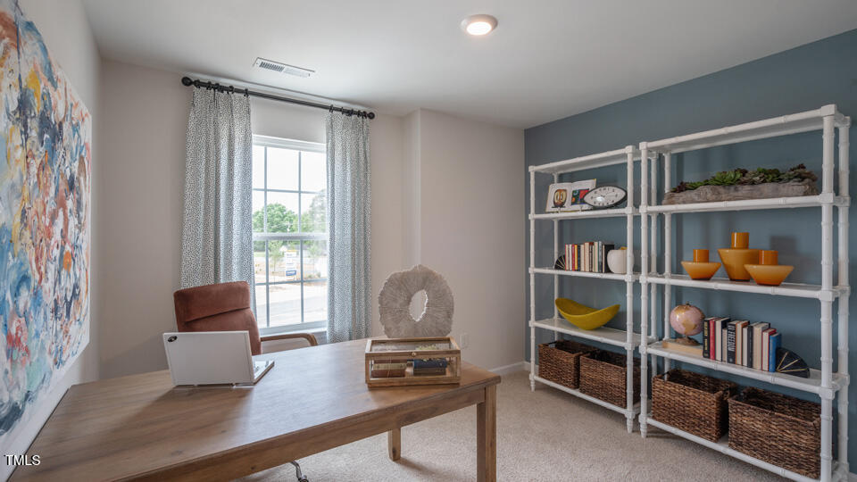292 Perseus Street Angier, NC 27501 - Photo 23 of 35 a room with furniture and a window