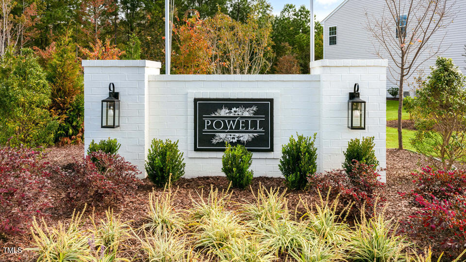 292 Perseus Street Angier, NC 27501 - Photo 34 of 35 front view of a house with garden
