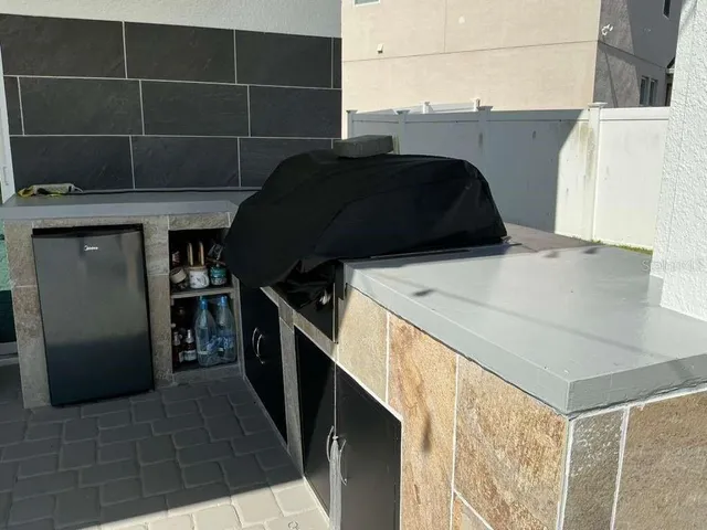 a view of a terrace with furniture