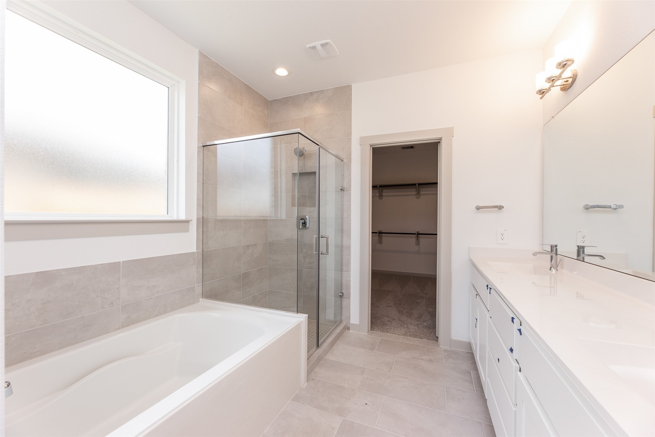 29502 Red Rocks Pk Drive Katy, TX 77494 - Photo 14 of 17 a bathroom with a bathtub and a sink
