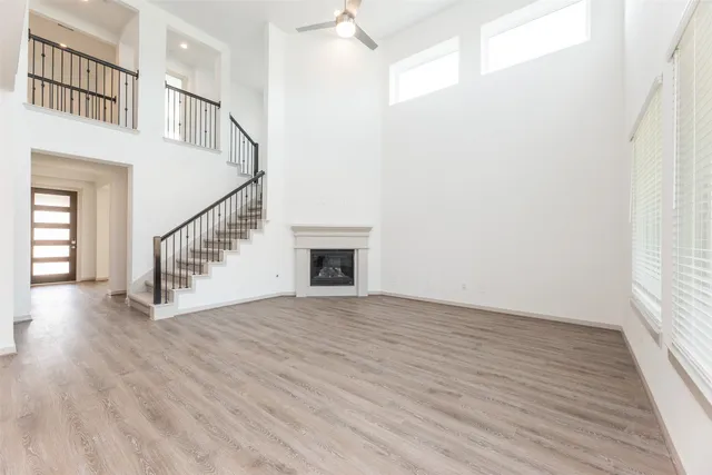a view of an entryway with wooden floor