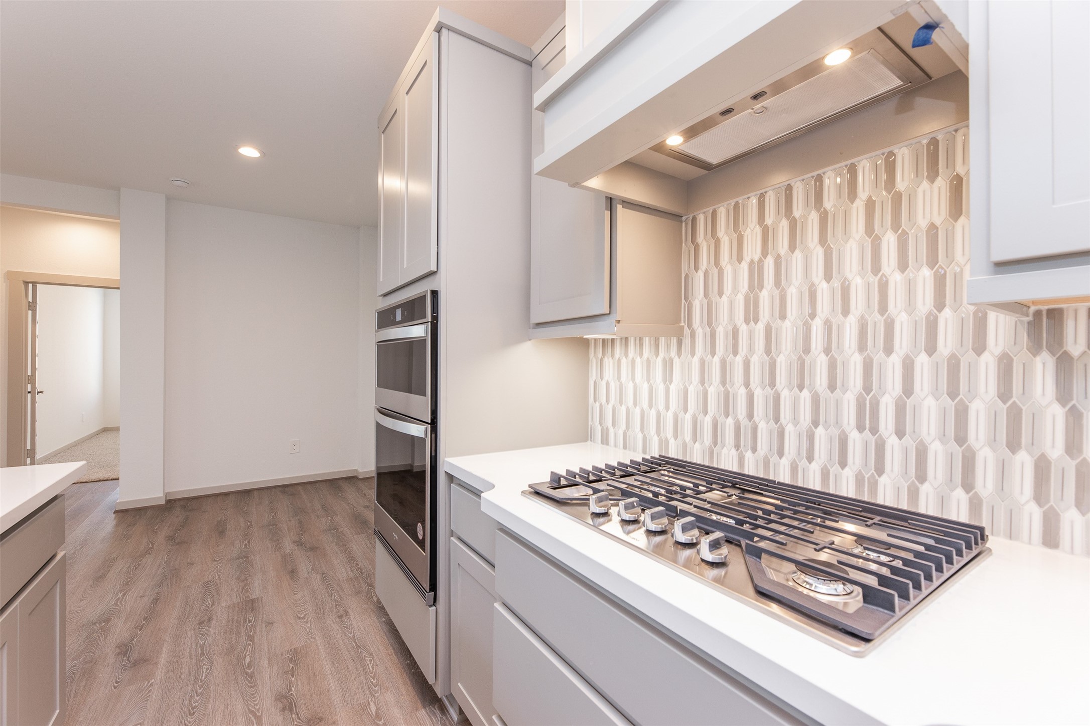 29502 Red Rocks Pk Drive Katy, TX 77494 - Photo 10 of 17 a kitchen with kitchen island granite countertop a stove and a refrigerator