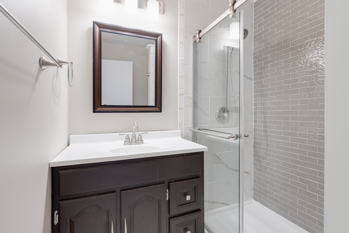 102 Harding Avenue Fox River Grove, IL 60021 - Photo 20 of 29 a bathroom with a sink and a mirror