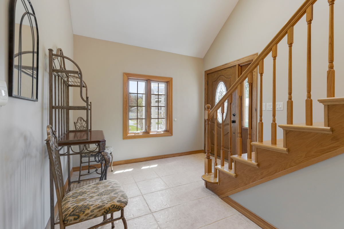 102 Harding Avenue Fox River Grove, IL 60021 - Photo 2 of 29 a view of an entryway with wooden floor and door