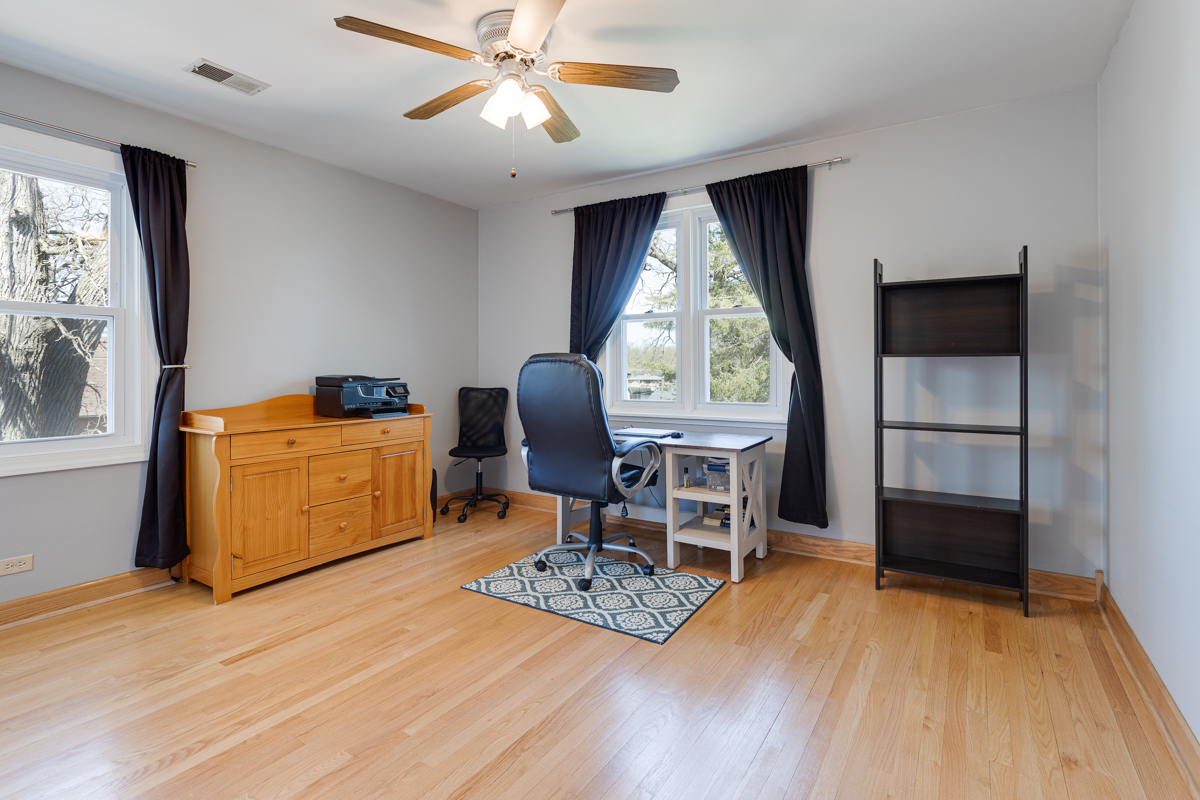 102 Harding Avenue Fox River Grove, IL 60021 - Photo 26 of 29 a view of a workspace with furniture and a window
