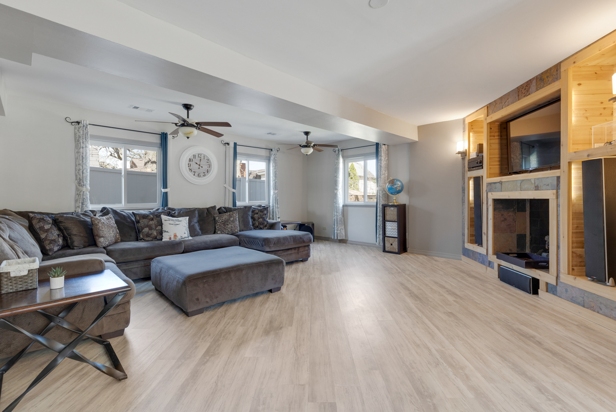 102 Harding Avenue Fox River Grove, IL 60021 - Photo 4 of 29 a living room with furniture and a fireplace