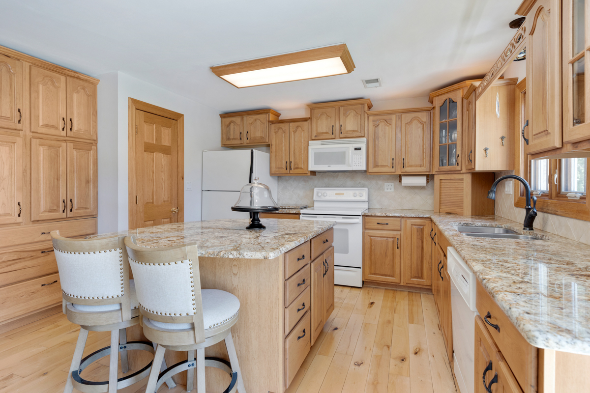 102 Harding Avenue Fox River Grove, IL 60021 - Photo 10 of 29 a kitchen with a sink stove and cabinets