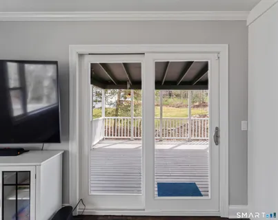a view of a two chairs in the balcony
