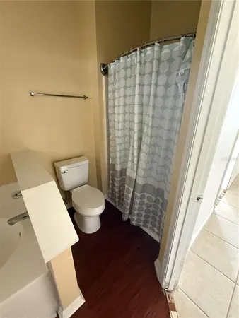 a white bath tub sitting next to a window