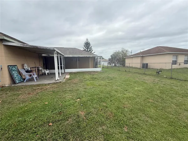 a backyard of a house with lots of green space