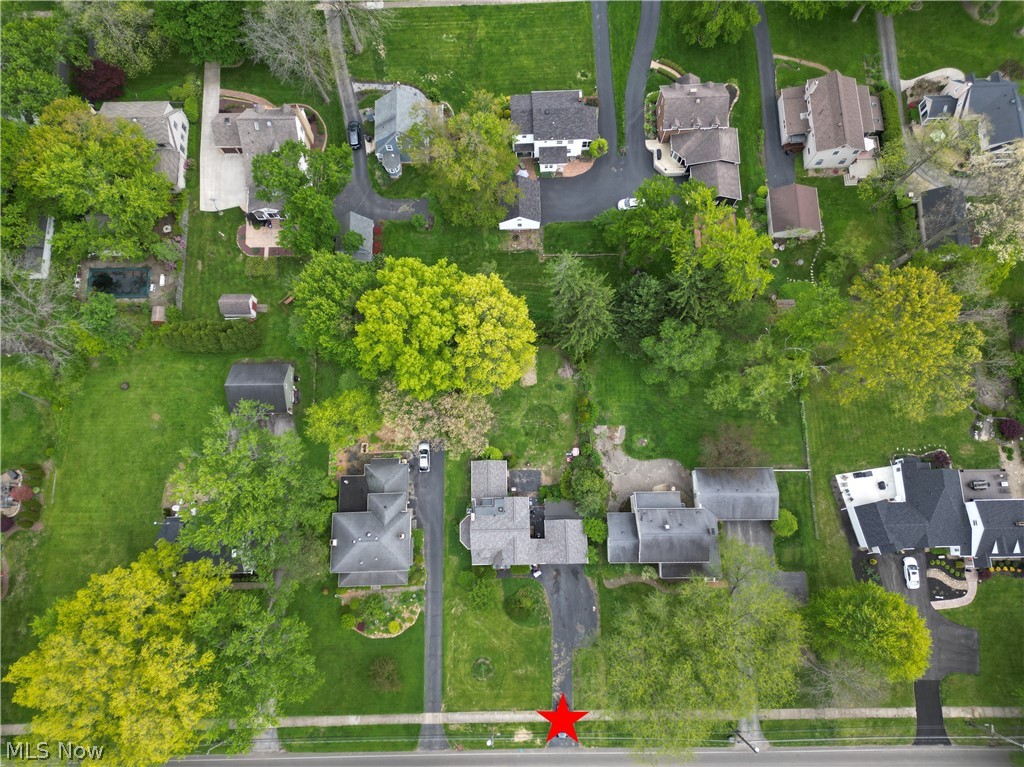 7121 North Lima Road Youngstown, OH 44514 - Photo 37 of 37 Aerial perspective showcasing a residential lot with mature trees, green lawns, and a paved driveway
